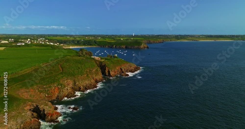 Wallpaper Mural Beautiful sea landscape, beautiful rocky coast, view from the drone in France. Aerial view of waves breaking over rocks in blue ocean. Small motor boats and yachts anchored in the bay Torontodigital.ca