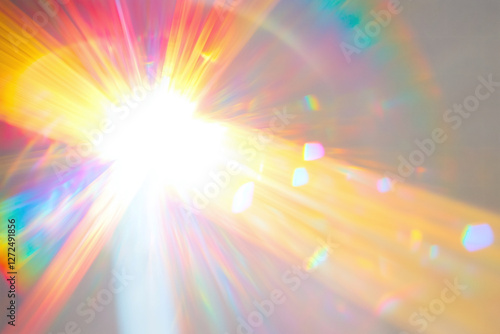 Bright rainbow light flare with prism effect on white background, creating vibrant and colorful display. light radiates in various hues, adding dynamic touch to any design