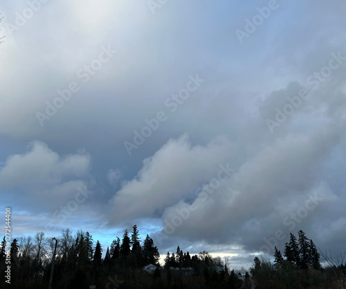 blue sky with clouds and rainbow