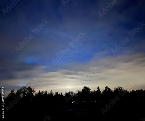 blue sky with clouds and rainbow
