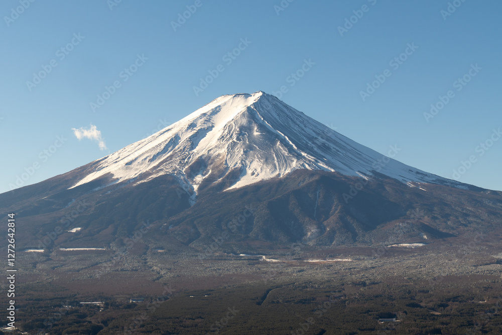 A breathtaking view of Mount Fuji, standing majestically above serene landscapes, with its iconic snow-capped peak and ever-changing seasonal beauty. A breathtaking view of Mount Fuji, standing majestically above serene landscapes, with its iconic snow-capped peak and ever-changing seasonal beauty.