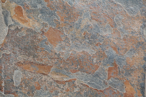 Beautiful slate stone tile natural background texture with gray, blue, orange, brown