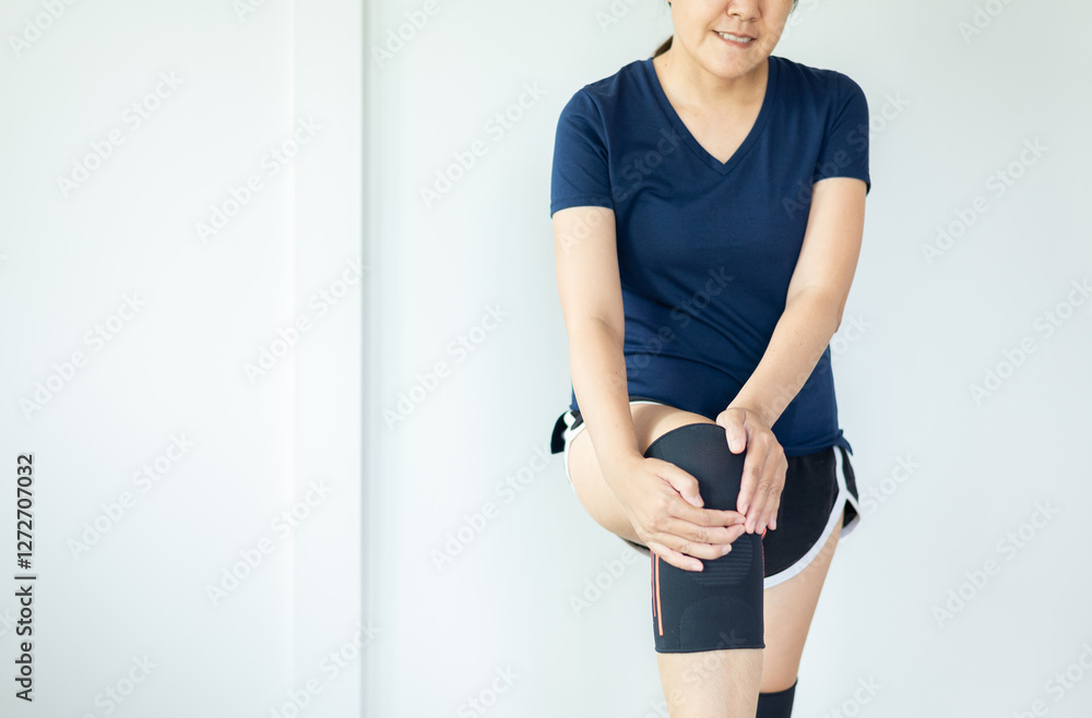 custom made wallpaper toronto digitalPatient woman using knee brace support on white background