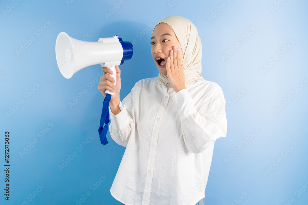 portrait of female holding megaphone shouting towards the megaphone portrait of female holding megaphone shouting towards the megaphone