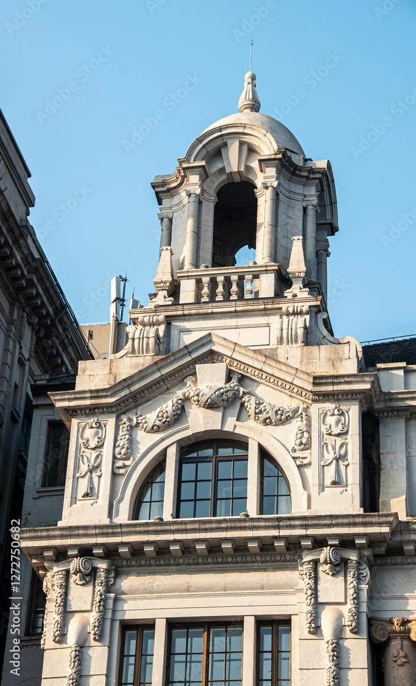 Fototapeta premium Detailed view of ornate historic building facade.
