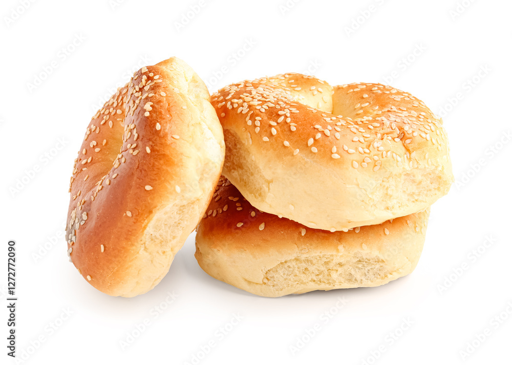 Tasty bagels with sesame seeds on white background Tasty bagels with sesame seeds on white background