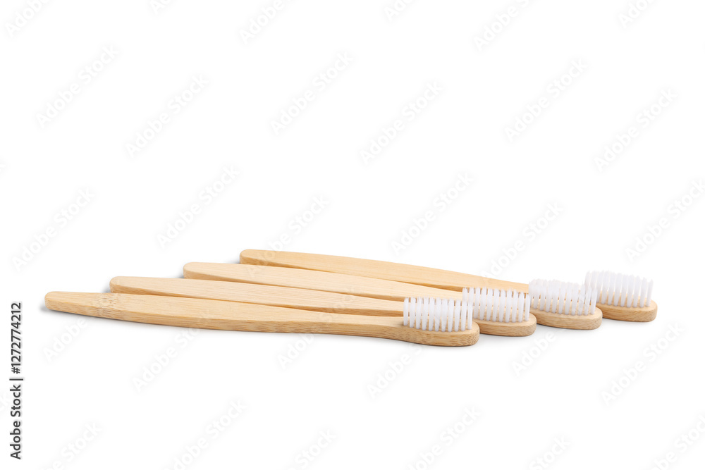 Naklejka premium Many bamboo toothbrushes on white background