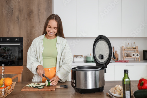 Young woman with multi cook...
