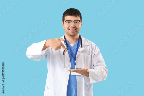 Male doctor pointing at his...