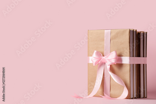Stack of books wrapped in b...
