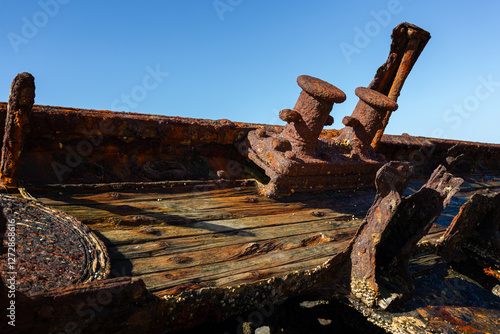 Close up view of the deck timbers and bollards on the shipwreck of the steam ship Maheno on Kgari-Fraser Island photo