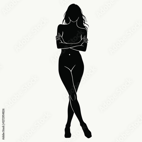 Silhouette of a woman standing with arms crossed