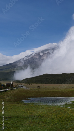 Vertical image of  the Lake and walkway at Cotopaxi National Park, Ecuador photo