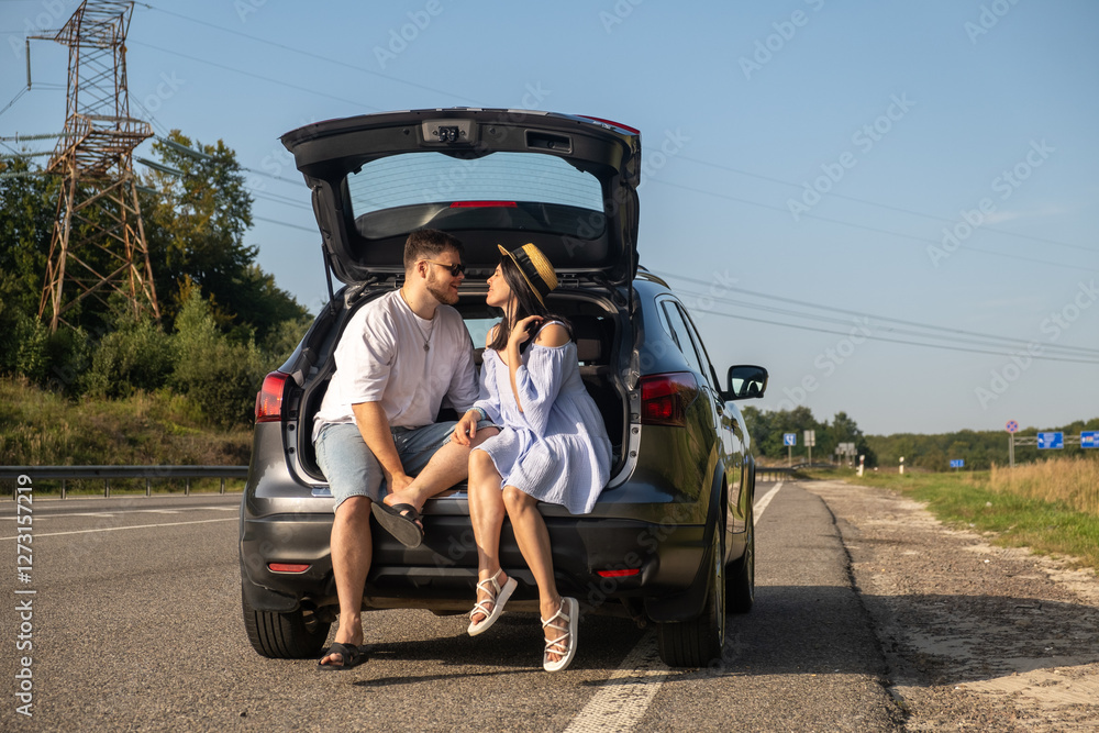 Couple Enjoying a Sunny Day by the Car
