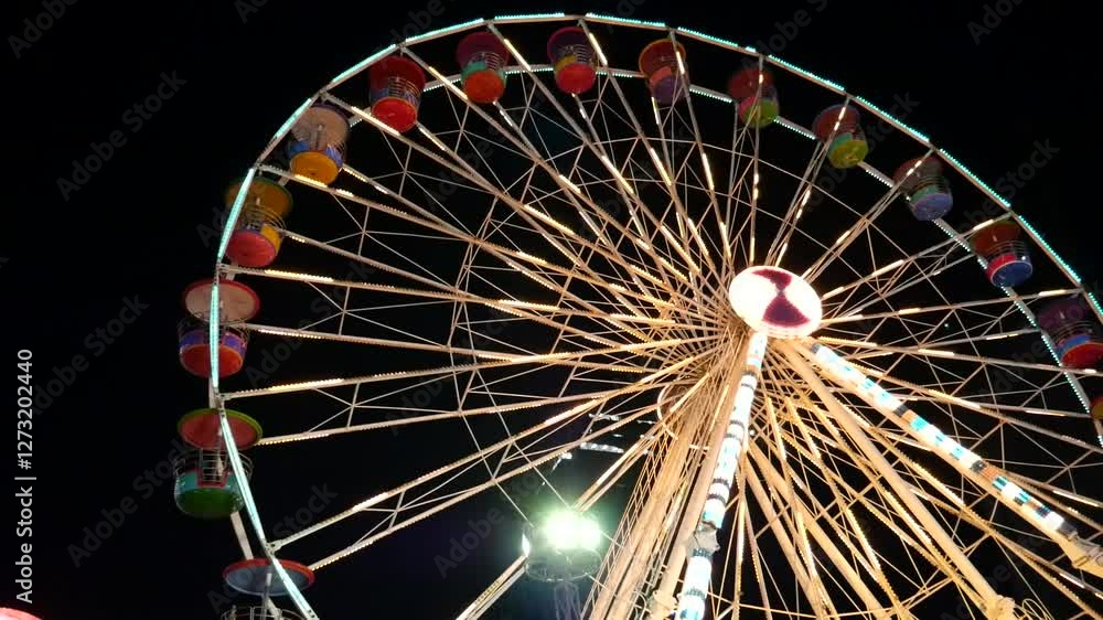 Ferris wheel in traveling carnival Ferris wheel in traveling carnival