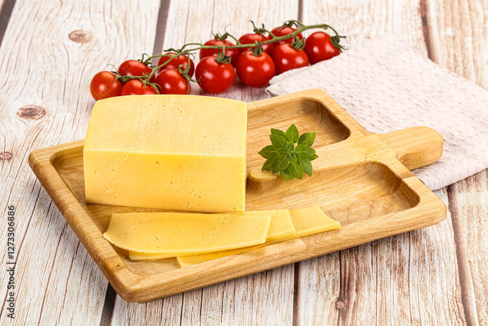 Yellow cheese piece with slices Yellow cheese piece with slices