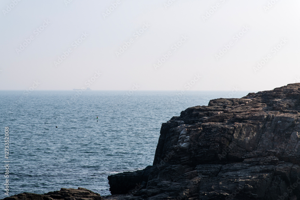 tranquil seascape with the seaside cliff