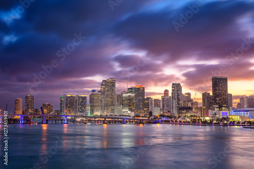 Miami, Florida, USA. Cityscape image of Miami, Florida with reflection of the city skyline in the water at beautiful sunset.