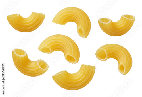 Close-up of individual pieces dry elbow macaroni pasta isolated on transparent background