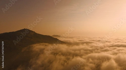 Wallpaper Mural A breathtaking sunset scene where the sun dips behind the peaks. Torontodigital.ca