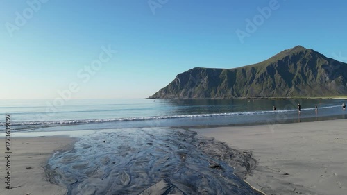 Landscape at Skagsanden Beach near Flakstad with a view of the summit of Hustinden. Lofoten district in Norway