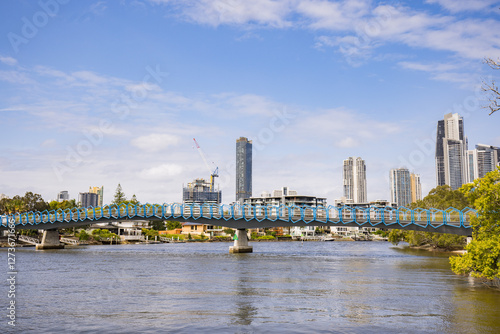 Blue footbridge walkway over the Nerang River at the Home of The Arts on the Gold Coast photo