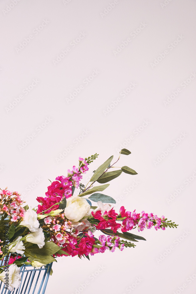 shopping cart with flowers and wooden boxes shopping cart with flowers and wooden boxes