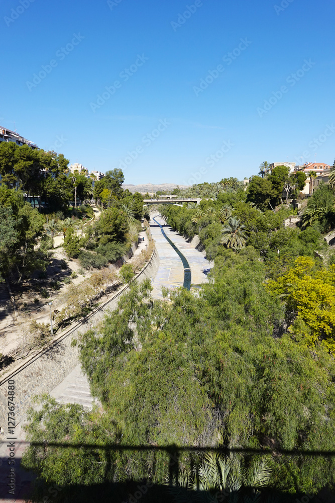 The view of the park and the river Vinalopo in Elche, Spain The view of the park and the river Vinalopo in Elche, Spain