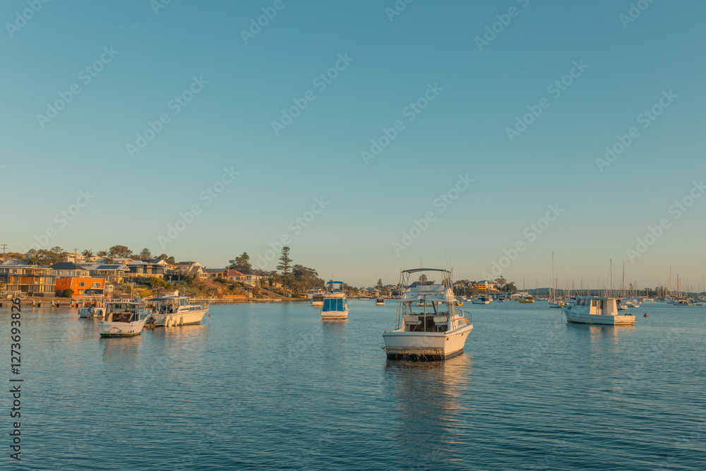 Boats anchored on Lake Maquarie at Belmont NSW Boats anchored on Lake Maquarie at Belmont NSW