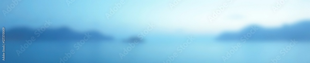 Softly fading blue and white gradient with a gentle glow, calm atmosphere, soft focus, serene landscape