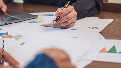 Obraz na płótnie business collaboration, financial analysis, and teamwork, professionals reviewing financial reports and discussing data. The workspace, charts, and strategic documents, a corporate and analytical w salonie