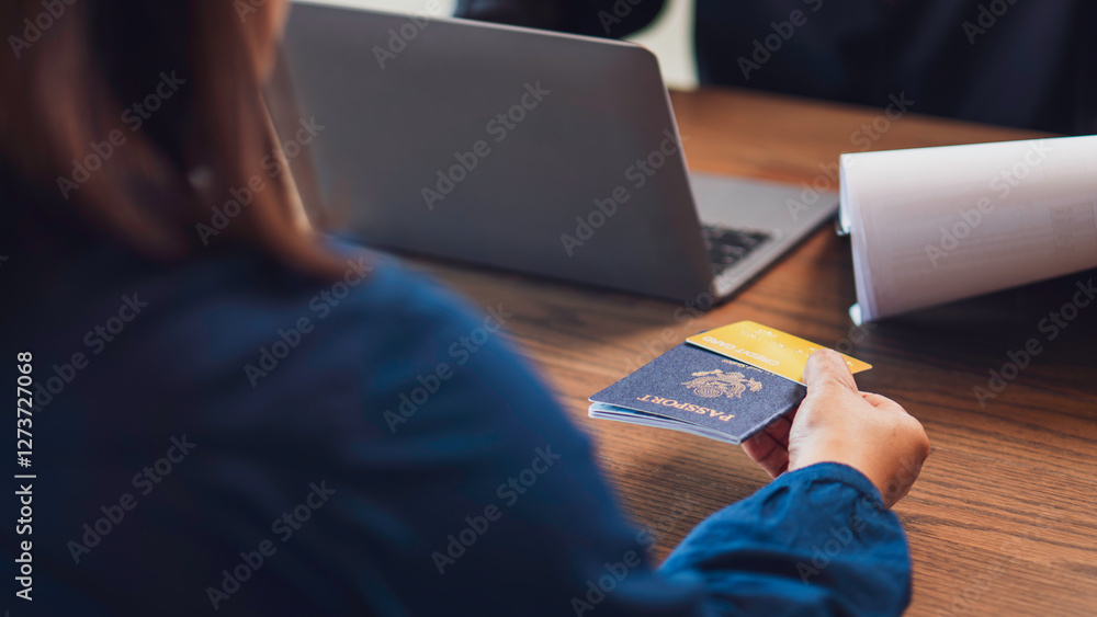 the concept of travel, finance, and identity verification, a close-up of hands exchanging a passport and a credit card, and documents international transactions, border security, and business travel.