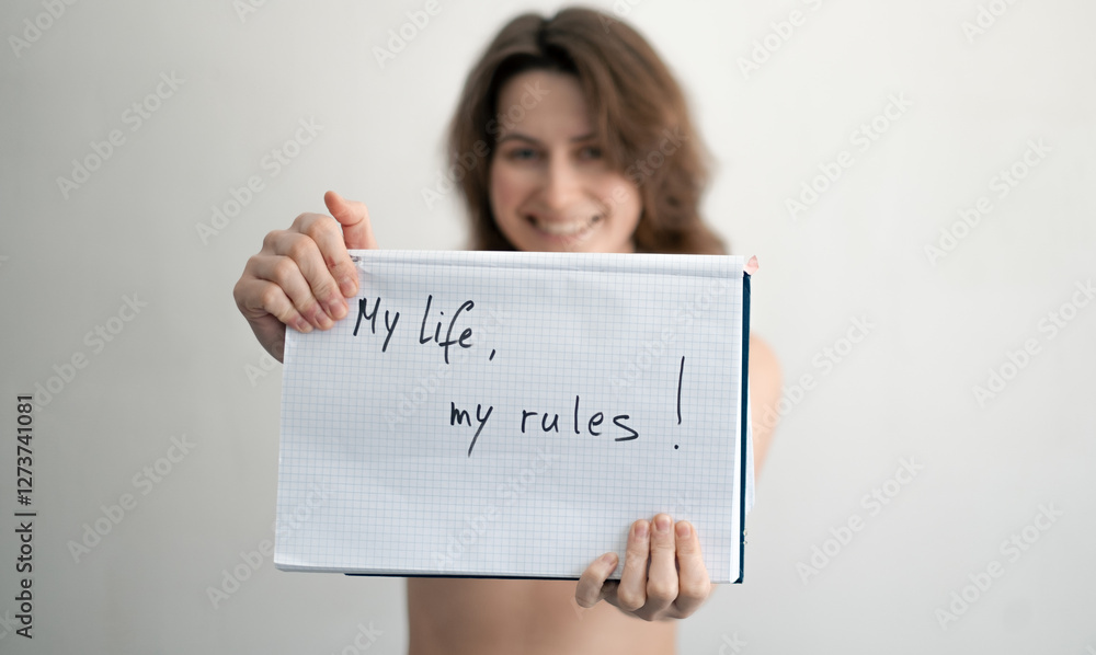 Woman holding 'My life, my rules' message, 4B Movement Woman holding 'My life, my rules' message, 4B Movement