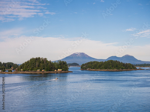 Boat on water with Mount Edgecumbe in background photo