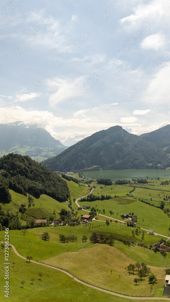 Breathtaking view of majestic mountains surrounded by pristine nature, bathed in warm sunlight. Breathtaking view of majestic mountains surrounded by pristine nature, bathed in warm sunlight.