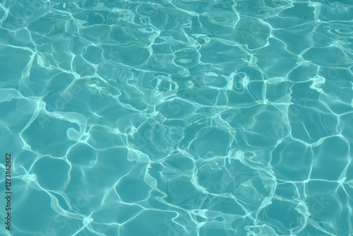 Blue water in swimming pool background