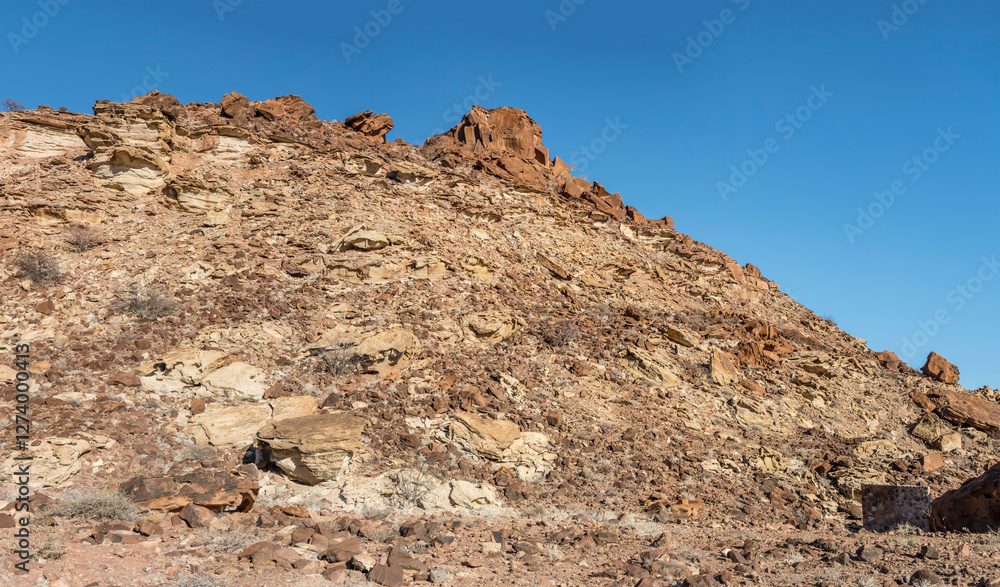 weathering rocks on slope of sandstone hills, at lodge near Twyfelfontein, Namibia