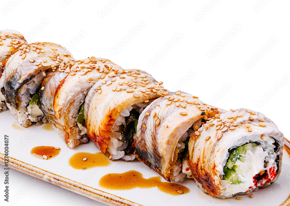 Freshly prepared sushi rolls with sesame and sauce on a platter Freshly prepared sushi rolls with sesame and sauce on a platter