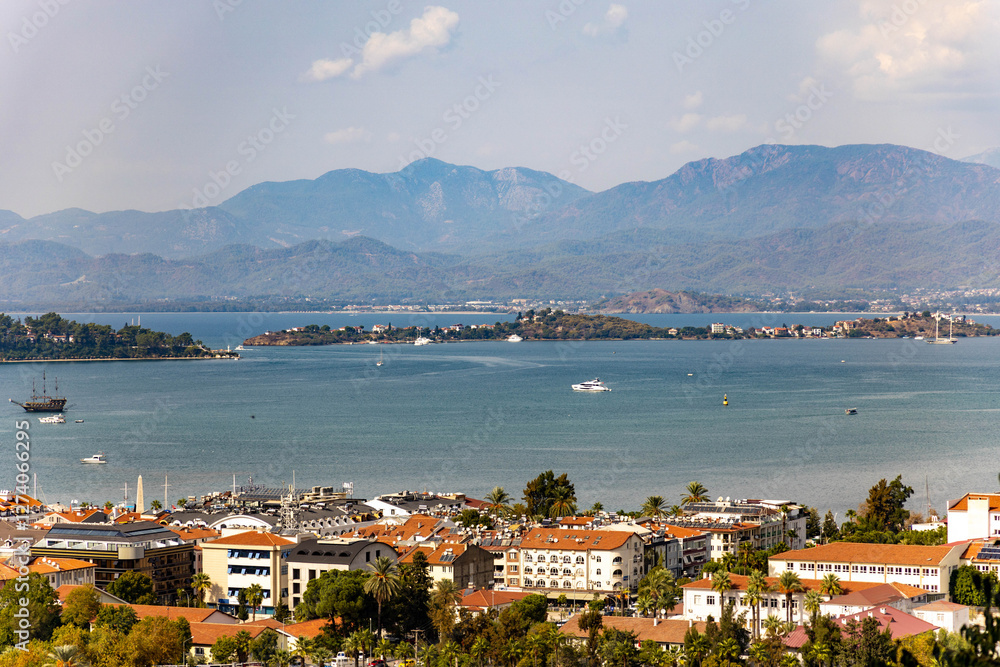 Obraz premium Aerial panorama of the bay of Fethiye city on a sunny autumn day. Fethiye, Mugla, Turkey. Mediterranean