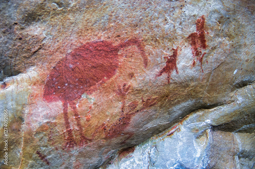 Aboriginal rock painting of an emu or cassowary and a human figure in Judbarra (Gregory) National Park,  Northern Territory, Australia