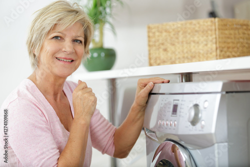 woman and home laundry concept photo