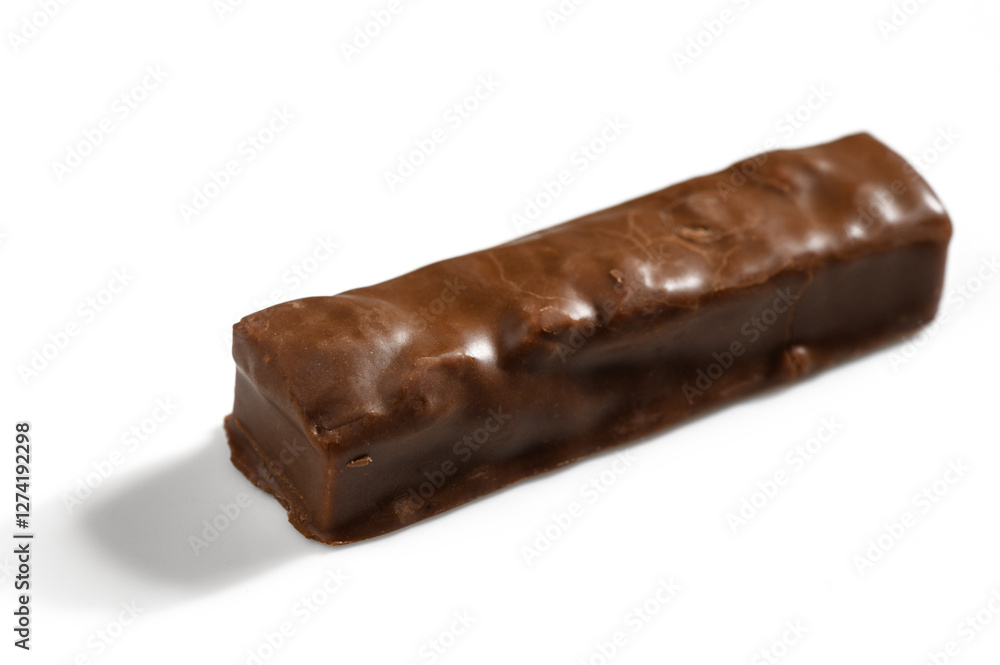 Chocolate confection with a smooth, glossy surface resting on a clean white backdrop Chocolate confection with a smooth, glossy surface resting on a clean white backdrop