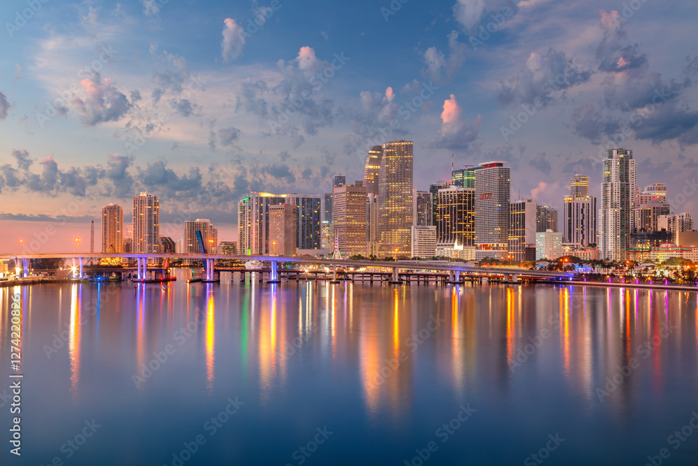 Miami, Florida, USA. Aerial cityscape image of Miami, Florida with reflection of the city skyline in the water at beautiful sunrise.