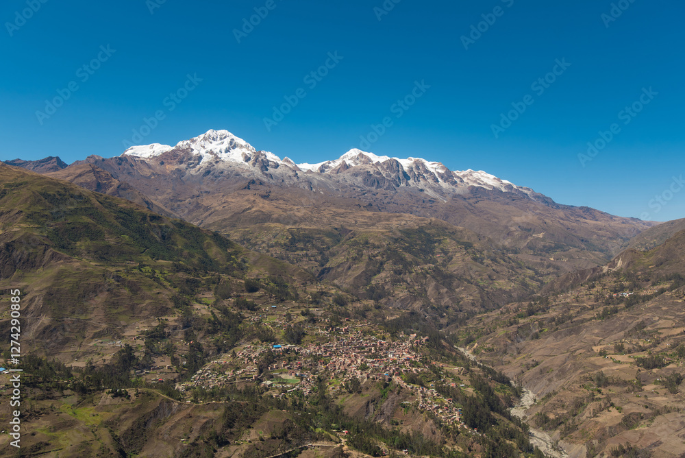 panoramic view from the willakollu viewpoint of sorata town, mountain Ancohuma and mountain illampu, the third and fourth highest mountains in Bolivia in the andes mountain range panoramic view from the willakollu viewpoint of sorata town, mountain Ancohuma and mountain illampu, the third and fourth highest mountains in Bolivia in the andes mountain range