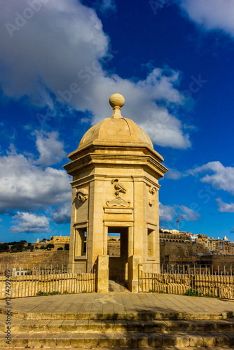 Historic Guard Tower With Blue Sky and Clouds in the Background photo