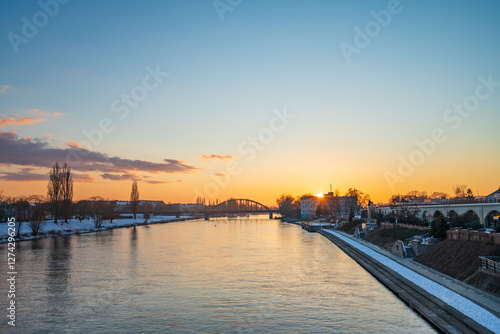 Wallpaper Mural Warta riverside at sunset in Gorzow Wielkopolski in winter. Poland Torontodigital.ca