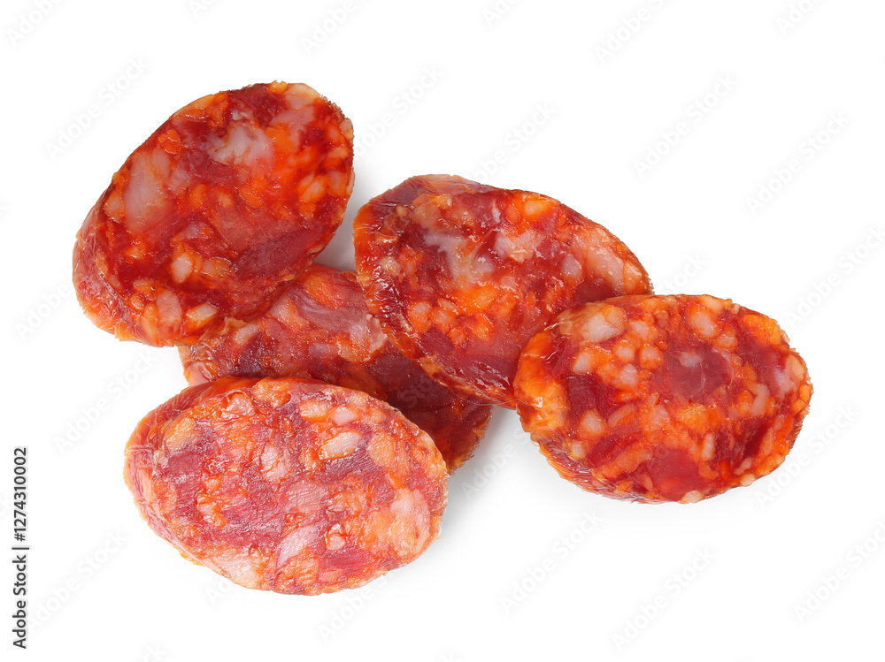 Pieces of delicious dry cured sausage isolated on white, top view Pieces of delicious dry cured sausage isolated on white, top view