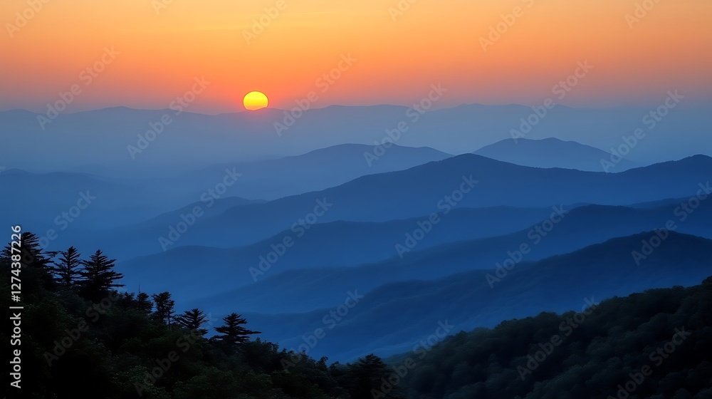 Obraz premium Layered Mountain Ridges at Dusk with Vivid Sunrise and Rolling Hills