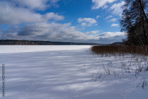 Fototapeta Naklejka Na Ścianę i Meble -  Nidzkie Lake in winter. Landscape of Masuria in Poland.