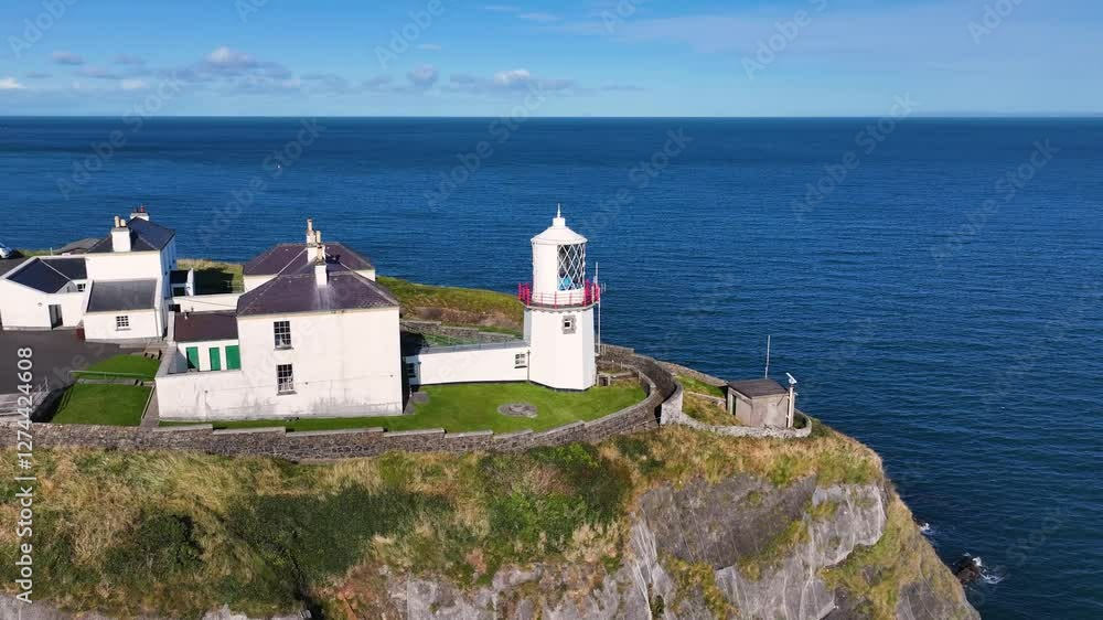 Aerial view of Blackhead Lighthouse on the beautiful and spectacular coastline of the Glens of Antrim Northern Ireland Aerial view of Blackhead Lighthouse on the beautiful and spectacular coastline of the Glens of Antrim Northern Ireland